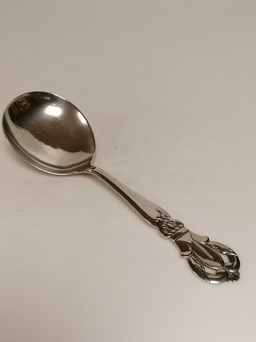 Serving spoon of three-tower silver