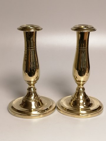 A pair of brass tulip poles