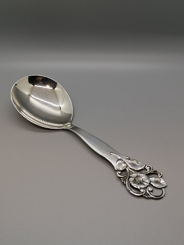 Serving spoon of three-tower silver